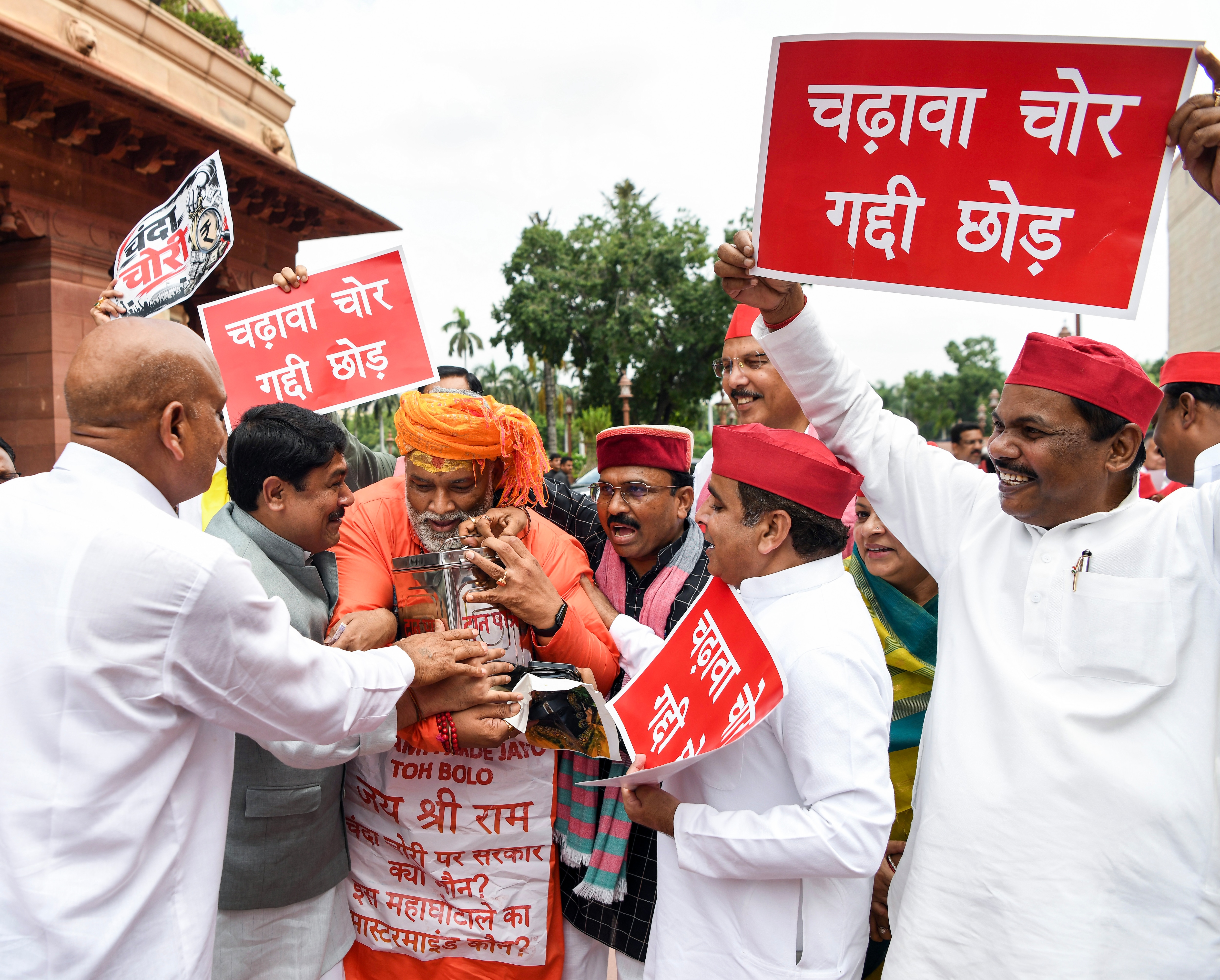 Independent MP Rajesh Ranjan (Pappu Yadav), SP MPs Anand Bhadauriya and Dharmendra Yadav, and other Opposition MPs protest at the Makar Dwar of the Parliament (Rahul Singh/ANI) Independent MP Rajesh Ranjan (Pappu Yadav), SP MPs Anand Bhadauriya and Dharmendra Yadav, and other Opposition MPs protest at the Makar Dwar of the Parliament (Rahul Singh/ANI)