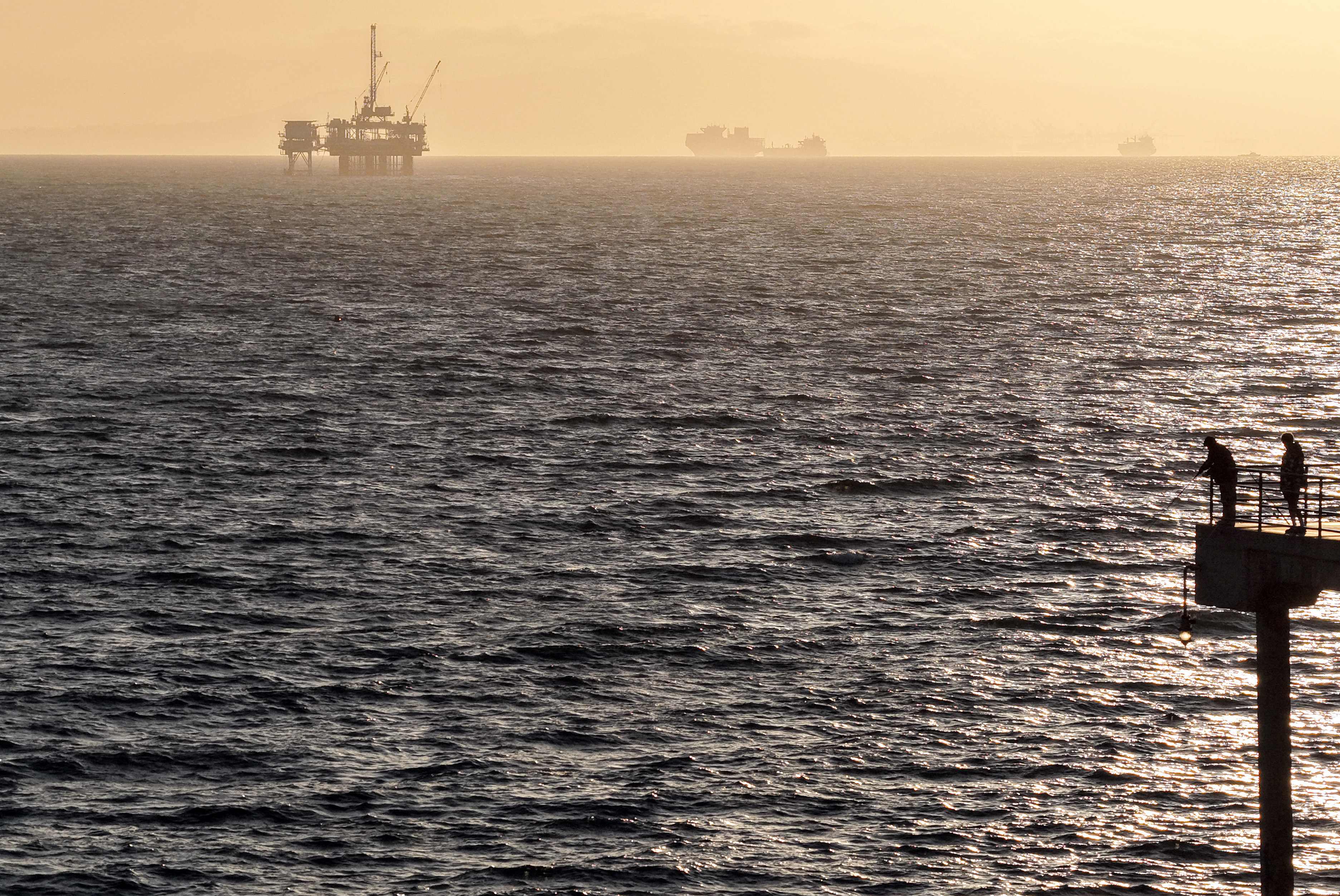 The offshore oil and gas platform Eva in the distance off Huntington Beach in California. (Getty Images via AFP) The offshore oil and gas platform Eva in the distance off Huntington Beach in California. (Getty Images via AFP)