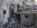Destroyed buildings at the scene of an Israeli airstrike in Nuseirat in the central Gaza Strip, Saturday.