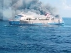 Plumes of smoke rise from a ferry which caught fire off Indonesia's Madura island, according to a statement by the Indonesian search and rescue agency, in this screengrab obtained from a video, East Java province, Indonesia, August 2, 2026. 