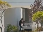 This still image captured from video by a witness shows the scene of a shooting that started at an In-N-Out Burger restaurant, Saturday, Aug. 1, 2026 in Twin Falls, Idaho. (Kevin Bell Jr. via AP)