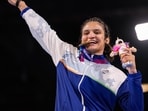 Gold medallist India's Arundhati Choudhary poses for photographs during the presentation ceremony after the women's 70kg final boxing event at the 23rd Commonwealth Games (CWG), in Glasgow
