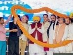 Punjab chief minister Bhagwant Mann during the financial assistance distribution function in Pathankot on Saturday. (@BhagwantMann X)