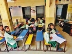 Shifted after their building was declared unsafe in 2017, 66 students of Government Primary School A-1 continue to study from another school campus in Shahpur Road as a land dispute stalls construction of a new building Government Primary School. (Gurpreet Singh/ht)