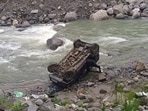 Two people were killed and three others injured after an SUV veered off the road and plunged into the Manalsu nullah in Old Manali on Saturday. (Deepak Sansta)