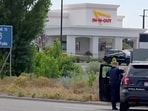 An emergency responder at the site of a fatal shooting incident in Twin Falls, Idaho.