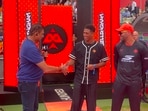 Ravi Shastri shakes hands with Jude Bellingham. Ravi Shastri shakes hands with Jude Bellingham.