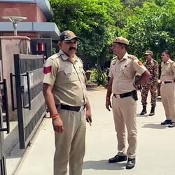 Security personnel deployed outside the National Testing Agency (NTA) office on June 21, in New Delhi on Saturday. 

