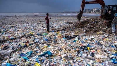 Plastic garbage washed ashore at Juhu Beach in Mumbai following high tides and monsoon rains, as Brihanmumbai Municipal Corporation (BMC) workers carry out a clean-up operation to clear the debris from the shoreline in mumbai, India, on Sunday, August 02, 2026. (HT Photo/Satish Bate) Plastic garbage washed ashore at Juhu Beach in Mumbai following high tides and monsoon rains, as Brihanmumbai Municipal Corporation (BMC) workers carry out a clean-up operation to clear the debris from the shoreline in mumbai, India, on Sunday, August 02, 2026. (HT Photo/Satish Bate)