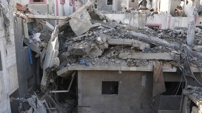 Destroyed buildings at the scene of an Israeli airstrike in Nuseirat in the central Gaza Strip, Saturday. (File Photo/AP) Destroyed buildings at the scene of an Israeli airstrike in Nuseirat in the central Gaza Strip, Saturday. (File Photo/AP)