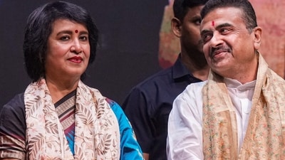 West Bengal chief minister Suvendu Adhikari and exiled Bangladeshi writer Taslima Nasrin during a citizens felicitation programme.\ (PTI) West Bengal chief minister Suvendu Adhikari and exiled Bangladeshi writer Taslima Nasrin during a citizens felicitation programme.\ (PTI)