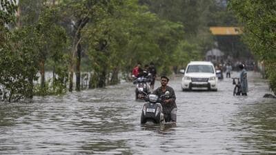 Palghar: Commuters wade through a waterlogged road after heavy rainfall, at Vasai-Virar in Palghar district, Maharashtra, Wednesday, July 8, 2026. (PTI Photo/Kunal Patil)(PTI07_08_2026_000482A) (PTI) Palghar: Commuters wade through a waterlogged road after heavy rainfall, at Vasai-Virar in Palghar district, Maharashtra, Wednesday, July 8, 2026. (PTI Photo/Kunal Patil)(PTI07_08_2026_000482A) (PTI)