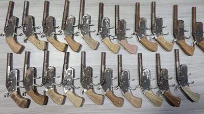 The country-made .315 bore pistols recovered from the accused. (Sourced) The country-made .315 bore pistols recovered from the accused. (Sourced)