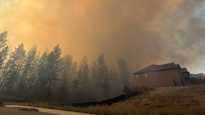 This photo provided by Spokane Fire District 9 shows the Upriver Fire burning northeast of Spokane, Wash., on Tuesday, June 16, 2026. (Robert Gray/Spokane Fire District 9 via AP) (Spokane Fire District 9 via AP) This photo provided by Spokane Fire District 9 shows the Upriver Fire burning northeast of Spokane, Wash., on Tuesday, June 16, 2026. (Robert Gray/Spokane Fire District 9 via AP) (Spokane Fire District 9 via AP)