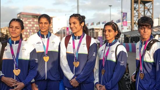 India’s gold medal-winning women boxers pose at the Glasgow Commonwealth Games on Saturday. (PTI)