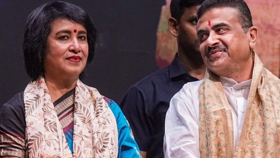 West Bengal chief minister Suvendu Adhikari and exiled Bangladeshi writer Taslima Nasrin during a citizens felicitation programme.\ (PTI)