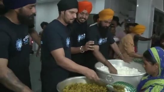 Randeep Hooda during flood relief drive in Assam's Sivasagar.
