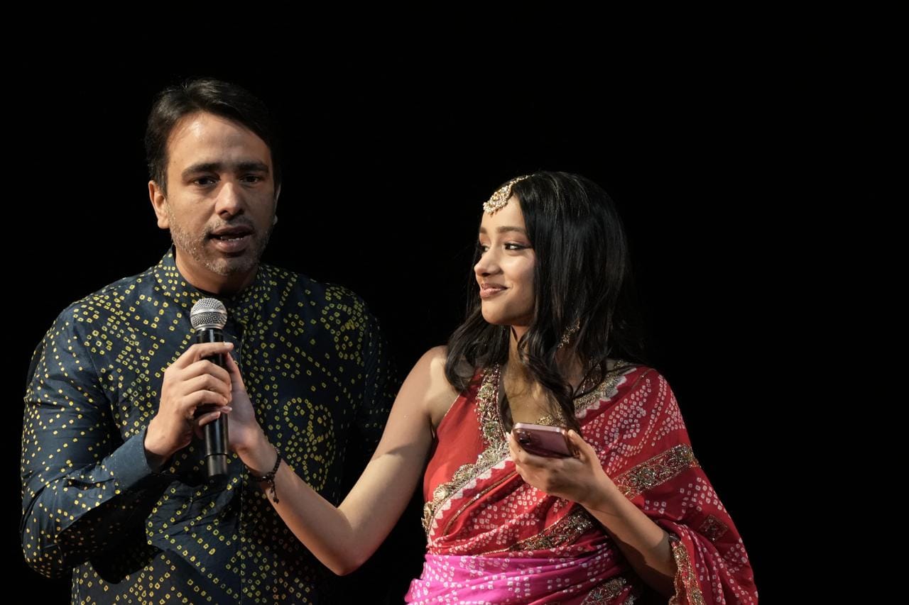 Minister of State (Independent Charge) Jayant Chaudhary praising Ilesha on stage.