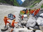 Officials said that with the assistance of the National Disaster Response Force (NDRF), the fire services team and local police, the vehicle was retrieved from the river. The bodies were found inside the vehicle. (HT Photo)