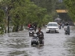 Palghar: Commuters wade through a waterlogged road after heavy rainfall, at Vasai-Virar in Palghar district, Maharashtra, Wednesday, July 8, 2026. (PTI Photo/Kunal Patil)(PTI07_08_2026_000482A) (PTI)