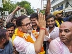 Patna: Jan Suraaj Party founder and candidate Prashant Kishor greets people during a march as he leads over BJP's Neeraj Kumar Sinha to 10,436 votes in the Bankipur assembly by-election after the counting crossed the halfway mark, on Aug. 3 (PTI)