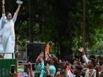 Trinamool Congress chairperson and former chief minister Mamata Banerjee greets party supporters in Kolkata. (Samir Jana/ HT Photo)