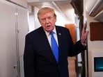 US President Donald Trump speaks to the press aboard Air Force One (AFP)