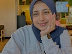 Woman balances work and side hustles for medical school.(Business Insider)