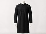 A black kurta acts as a versatile base for occasion styling, 