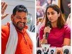 Ex-WFI chief Brij Bhushan Sharan Singh and World Championship medallist Vinesh Phogat.
