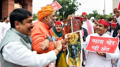 Independent MP Rajesh Ranjan (Pappu Yadav), and other Opposition MPs protest at the Makar Dwar of the Parliament over the issue of alleged Ayodhya Ram Mandir donations embezzlement. (Rahul Singh/ANI) Independent MP Rajesh Ranjan (Pappu Yadav), and other Opposition MPs protest at the Makar Dwar of the Parliament over the issue of alleged Ayodhya Ram Mandir donations embezzlement. (Rahul Singh/ANI)