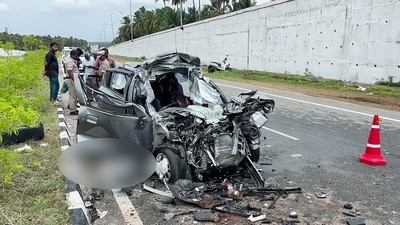 A view of the damaged car after it crashed into a stationary lorry near the Nallampalli Junction on the Pollachi–Palani National Highway, (Komangalam Police/ANI video grab)