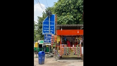 Before arriving at the embassy of Senegal, you are obliged to pass by a roadside kiosk crammed with packets of kurkure and aloo bhujia. (Mayank Austen Soofi) Before arriving at the embassy of Senegal, you are obliged to pass by a roadside kiosk crammed with packets of kurkure and aloo bhujia. (Mayank Austen Soofi)