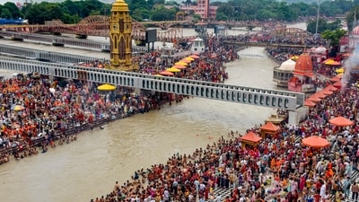 'Kanwariyas' and others take a holy dip in the Ganga river during the annual 'Kanwar Yatra', at Har Ki Pauri, in Haridwar, Uttarakhand. (PTI) 'Kanwariyas' and others take a holy dip in the Ganga river during the annual 'Kanwar Yatra', at Har Ki Pauri, in Haridwar, Uttarakhand. (PTI)