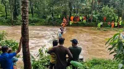 **EDS: SCREENGRAB VIA PTI VIDEOS** Kannur: Search operation underway for a man swept away in the Kanjirappuzha river, in Kannur, Kerala, Sunday, Aug. 2, 2026. (PTI Photo)(PTI08_02_2026_000403B) (PTI) **EDS: SCREENGRAB VIA PTI VIDEOS** Kannur: Search operation underway for a man swept away in the Kanjirappuzha river, in Kannur, Kerala, Sunday, Aug. 2, 2026. (PTI Photo)(PTI08_02_2026_000403B) (PTI)