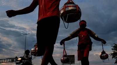 Gram it: As the season of Saawan continues, here's how Kanwar Yatris were spotted carrying water from river Ganga alongside National Highway 48, in Gurugram. Several kanwariyas have been returning to the NCR, and offering holy water to Lord Shiva during monsoon. (Photo: PTI)