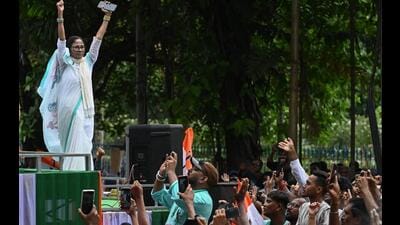 Trinamool Congress chairperson and former chief minister Mamata Banerjee greets party supporters in Kolkata. (Samir Jana/ HT Photo) Trinamool Congress chairperson and former chief minister Mamata Banerjee greets party supporters in Kolkata. (Samir Jana/ HT Photo)