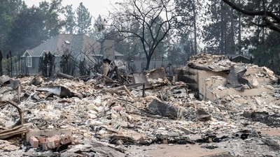 Spokane wildfires update: Thousands of people were ordered to evacuate their homes Saturday and overnight into Sunday, as three separate fires broke out in and around the city in the east of Washington state. (Photo by Erick Doxey / AFP) (AFP) Spokane wildfires update: Thousands of people were ordered to evacuate their homes Saturday and overnight into Sunday, as three separate fires broke out in and around the city in the east of Washington state. (Photo by Erick Doxey / AFP) (AFP)