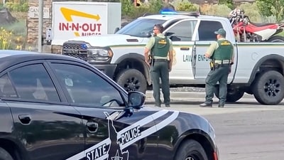 Emergency responders at the site of a fatal shooting incident in Twin Falls, Idaho, U.S., August 1, 2026, in this still image obtained from a video. (ABC AFFILIATE KIVI/Handout via REUTERS) (via REUTERS)