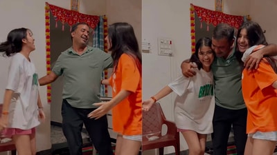 The father and his daughters share a joyful dance after reuniting. (Instagram/@__official_mahi_23) The father and his daughters share a joyful dance after reuniting. (Instagram/@__official_mahi_23)
