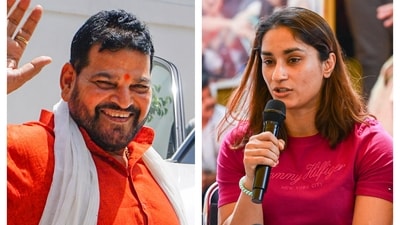 Ex-WFI chief Brij Bhushan Sharan Singh and World Championship medallist Vinesh Phogat. Ex-WFI chief Brij Bhushan Sharan Singh and World Championship medallist Vinesh Phogat.