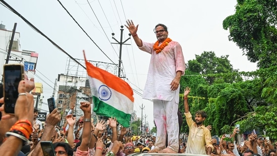 Jan Suraaj Party (JSP) founder Prashant Kishor waves at party workers during a victory march as he takes the lead in the Bankipur assembly bypoll result, in Patna on Monday. (ANI)