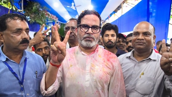 Jan Suraaj Party chief Prashant Kishor flashes the victory sign after taking the lead in the Bankipur Assembly by-election during the counting of votes, in Patna, Monday, Aug. 3,