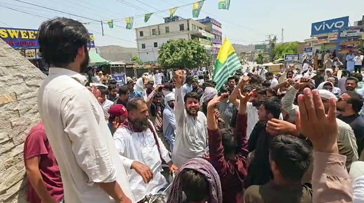 Protesters in Bhimber on Tuesday. (ANI Video Grab) Protesters in Bhimber on Tuesday. (ANI Video Grab)