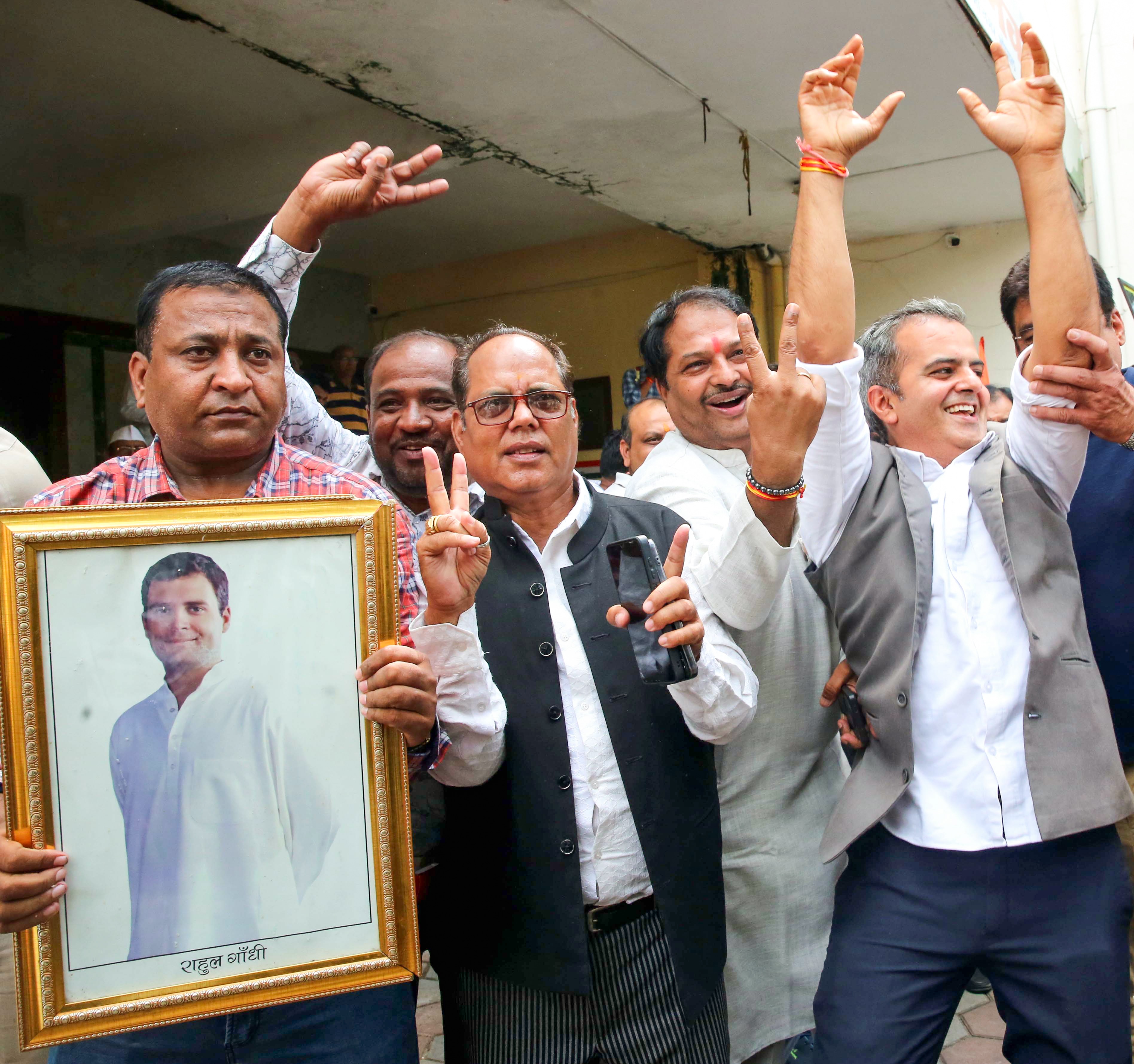 Congress workers celebrate the party's victory in the Datia Assembly by-elections at the PCC headquarters, in Bhopal on Monday. (ANI) Congress workers celebrate the party's victory in the Datia Assembly by-elections at the PCC headquarters, in Bhopal on Monday. (ANI)