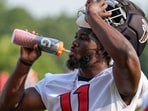 Atlanta Falcons linebacker Jalon Walker suffered what appeared to be a serious injury during training camp practice.