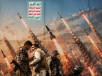 Houthi activists stand on a platform against a banner depicting Houthi missiles, at an anti-Saudi rally amid an escalation with the kingdom, in Sanaa, Yemen, 