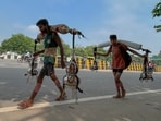Kanwariyas seen carrying holy water from the Ganga River Haridwar.