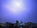 Lightning illuminates the skyline in Lucknow on Monday. (Deepak Gupta/HT Photo)