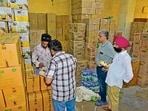 Officials of the food safety department during the raid in Deep Nagar, Ludhiana on Tuesday. (Gurpreet Singh/HT)
